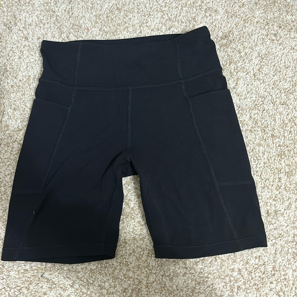 Athleta girl Stash Your treasures tight biker shorts 6” Size M/8-10